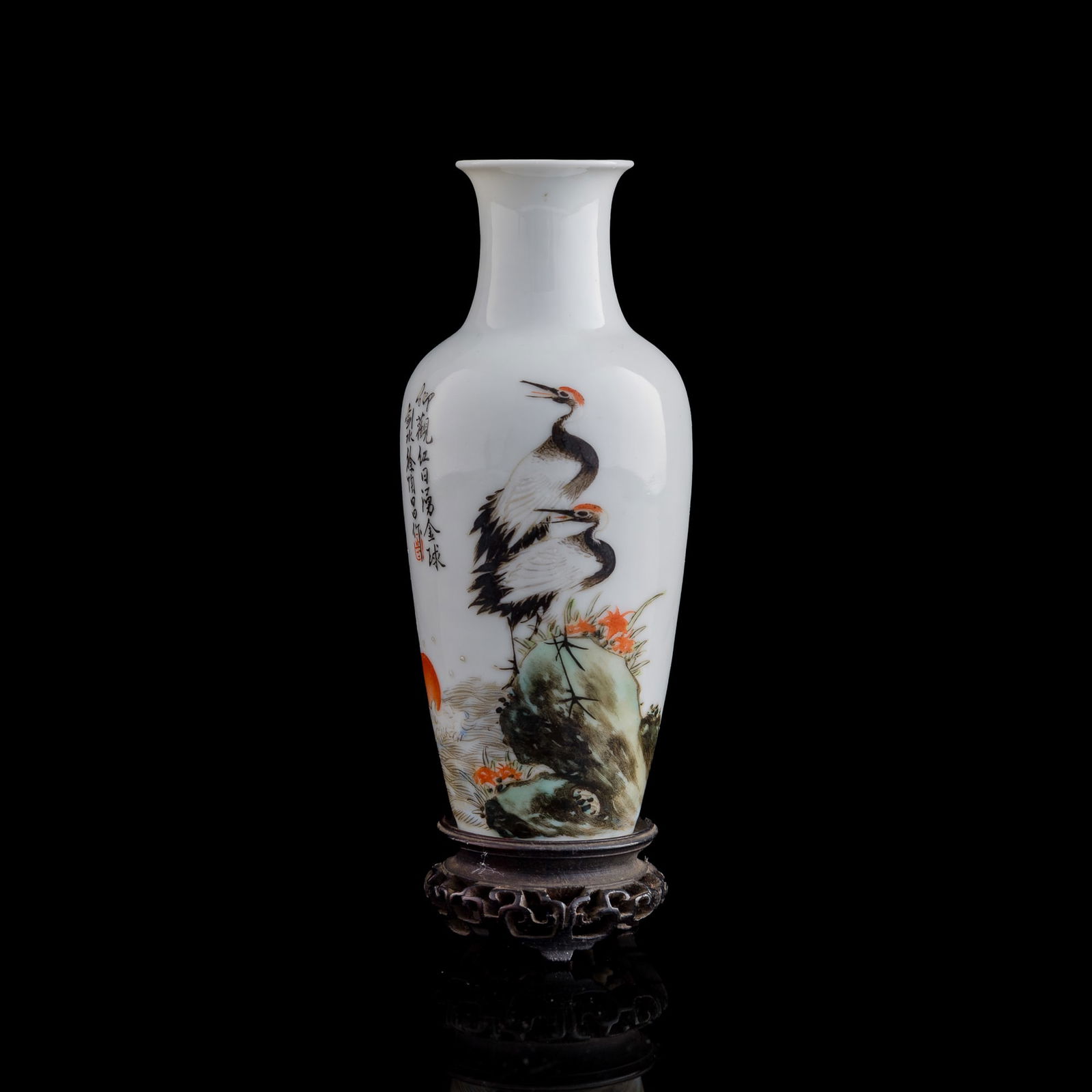 A Chinese famille rose 'crane' vase, Republic period: A Chinese famille rose 'crane' vaseRepublic periodThe body painted in famille rose enamels with a rising sun and a pair of cranes beside waves, signed Xu Taochang. Sold with an original hardwood