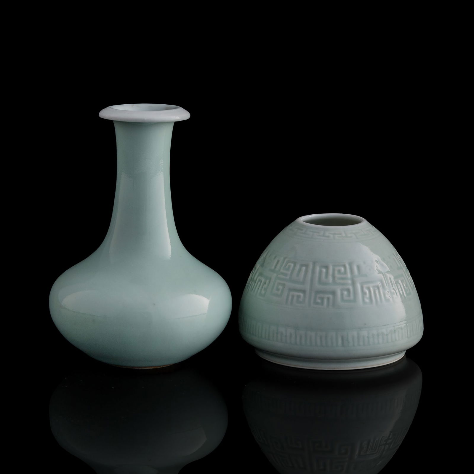 A Chinese pale celadon-blue glaze vase and a water coupe, Republic period: A Chinese pale celadon-blue glaze vase and a water coupeRepublic periodEach with a six-character mark to the underside. (2).H: 5, Dia: 3 3/8 in. (H: 12.7, Dia: 8.6 cm. (largest))Ms. Tang, Frisco,
