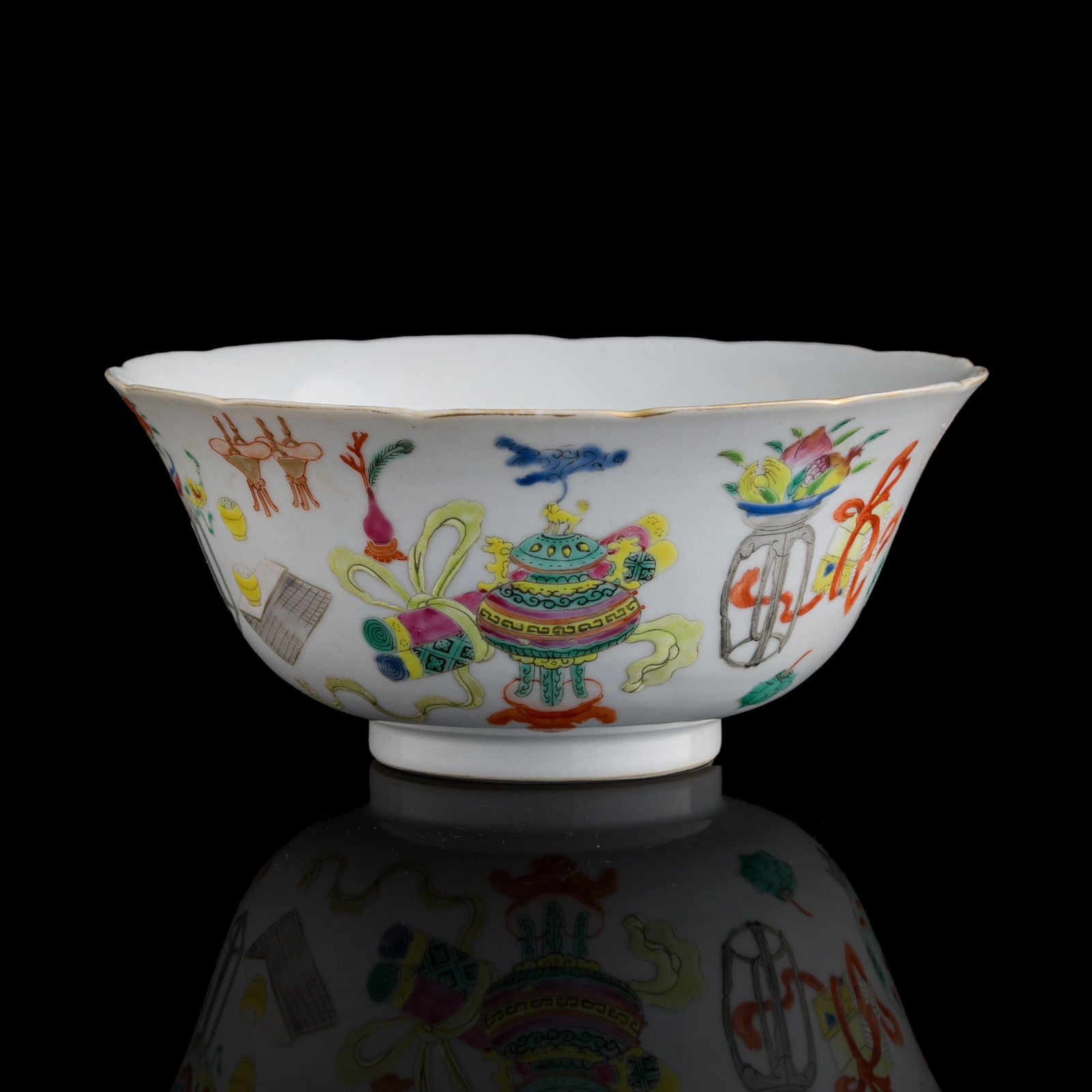 A Chinese famille rose 'hundred antiques' floral-rim bowl, Daoguang period, Qing dynasty (1 of 8)