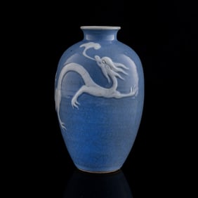 A Chinese celadon-glazed slip-decorated ‘dragon’ vase, 19th century
