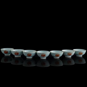 Seven Chinese celadon-glazed and iron-red bowls, early 19th century