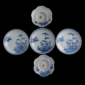 Three Chinese porcelain dishes and two cup saucers, Qing dynasty