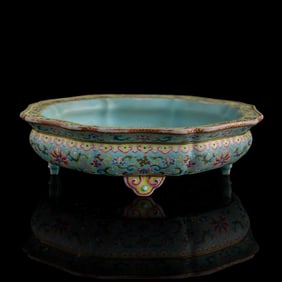 A Chinese turquoise-ground famille rose 'lotus scroll' washer, Qing dynasty