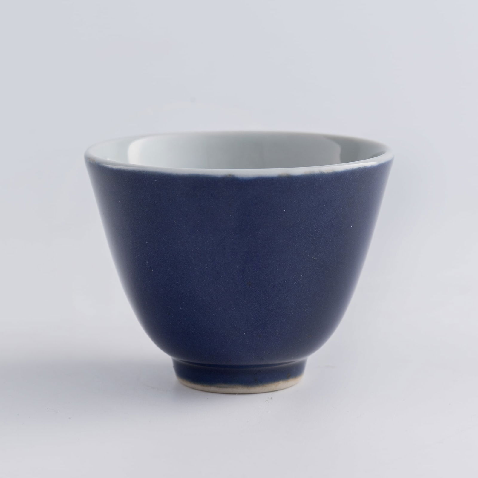 A Chinese blue-glazed cup, Qing dynasty (1 of 8)