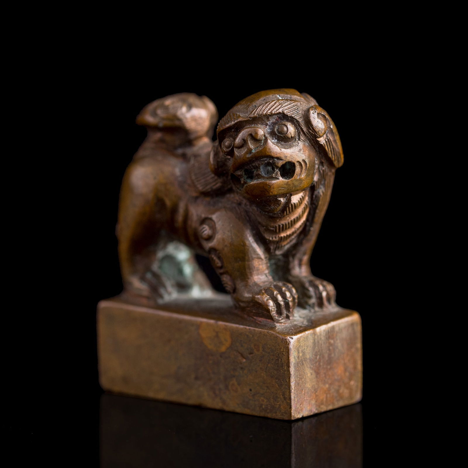 A Chinese copper-alloy seal with lion finial, 18th century (1 of 7)