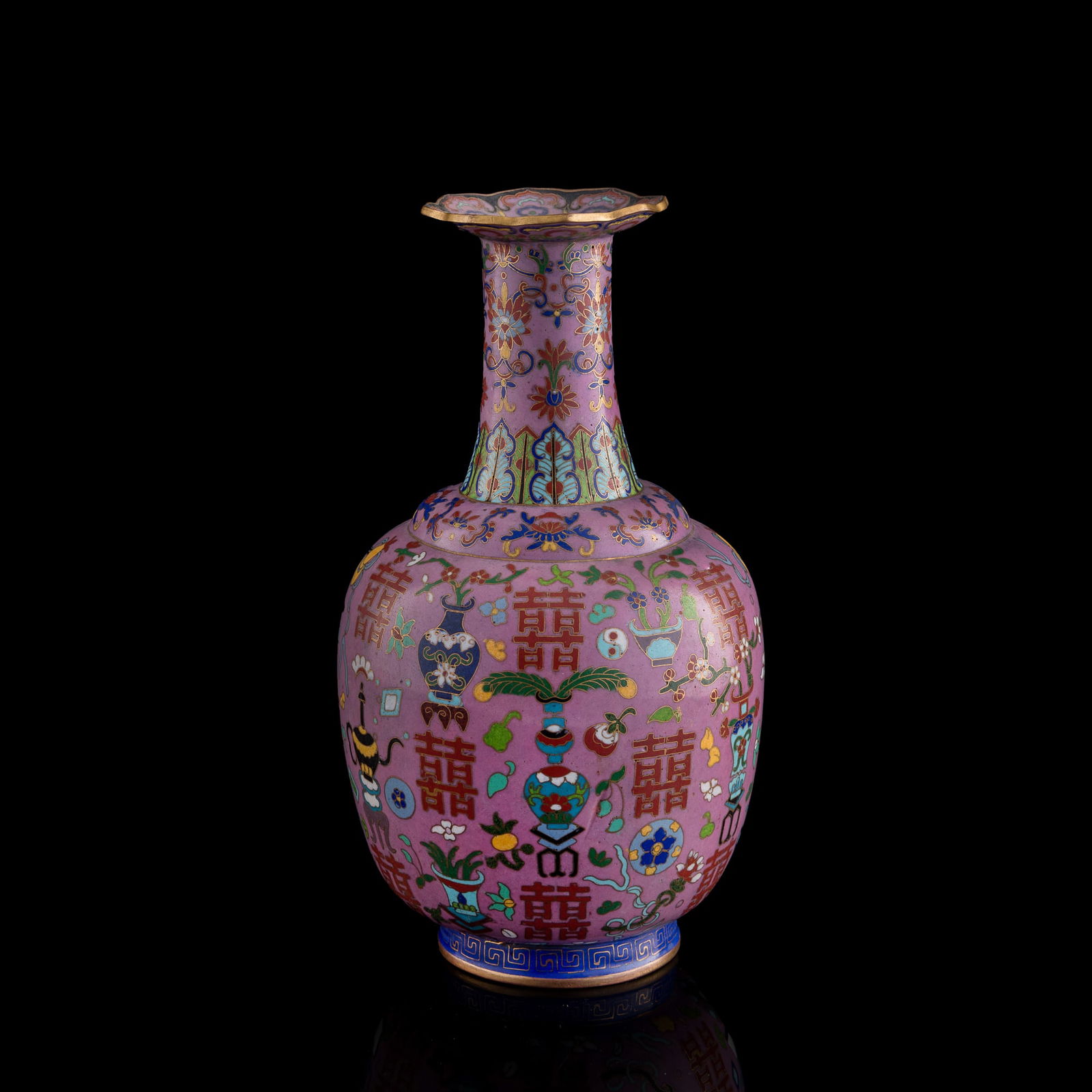 A Chinese pink-ground cloisonne ‘double happiness’ vase, early 19th century: A Chinese pink-ground cloisonne ‘double happiness’ vase early 19th century Decorated with scrolling floral motifs and 'double happiness' characters. H: 12, Dia: 6 5/8 in. (H: 30.5, Dia: 16.8 cm.)