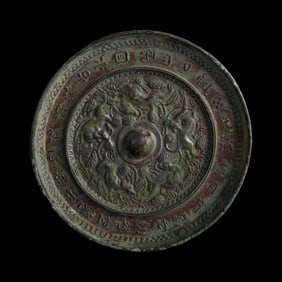 A Chinese bronze mirror, Tang dynasty