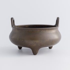 A Chinese bronze censer with loop handles, 18th/19th century