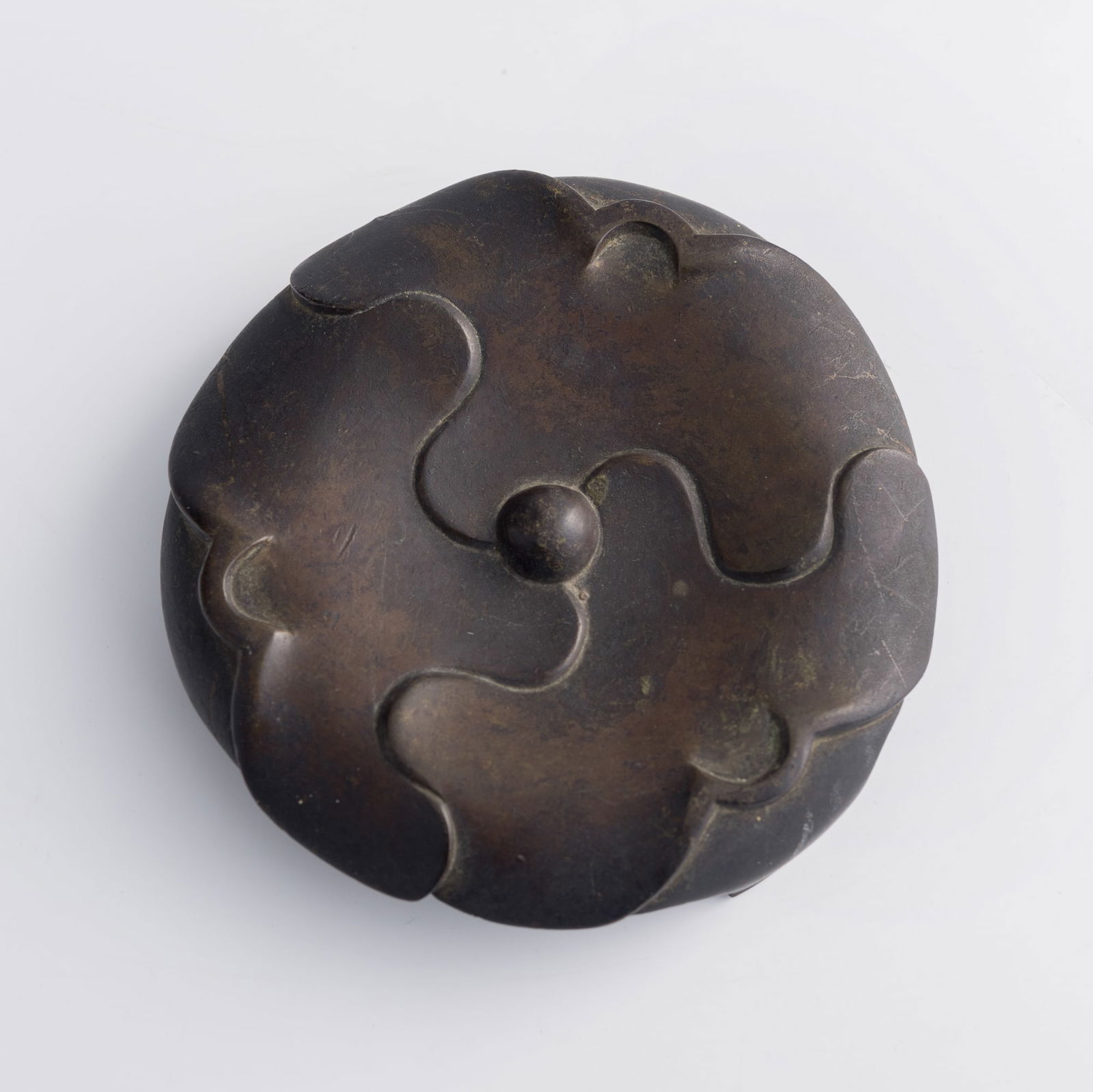 A Chinese bronze censer stand, 18th/19th century: A Chinese bronze censer stand18th/19th centuryH: 1, Dia: 5 in. (H: 2.5, Dia: 12.7 cm.)Weight: 684.3 gPrivate collection, Southern California.Click here for high resolution images. 