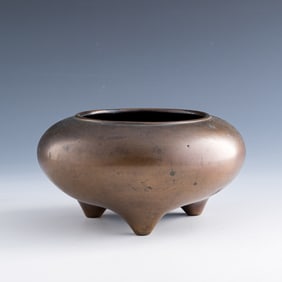 A Chinese bronze bowl-form tripod incense burner