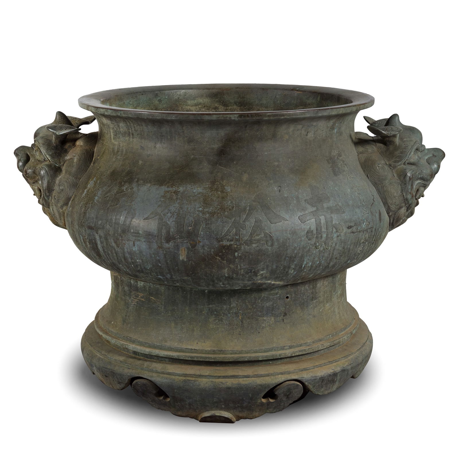 A large Chinese 'lion's head' bronze censer, 32nd year of Guangxu period, Qing dynasty: A large Chinese 'lion's head' bronze censer32nd year of Guangxu period, Qing dynastyThe large censer with thick rim, two lion's head handles, and three short scalloped ruyi-form feet. With