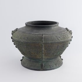 A Chinese archaistic bronze zun-form vase, 19th century