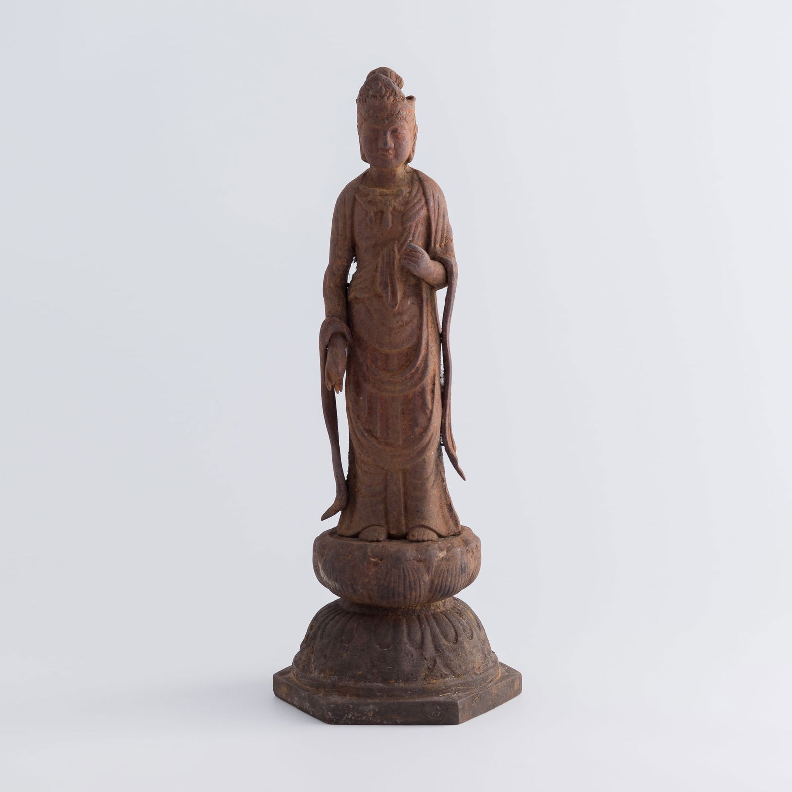 A Chinese iron figure of Guanyin, Ming dynasty or earlier: A Chinese iron figure of GuanyinMing dynasty or earlierH: 14 3/8, W: 5 3/4, D: 5 7/8 in. (H: 36.5, W: 14.6, D: 14.9 cm.)Weight: 2711 gPrivate collection, Dallas, Texas.Click here for high resolution