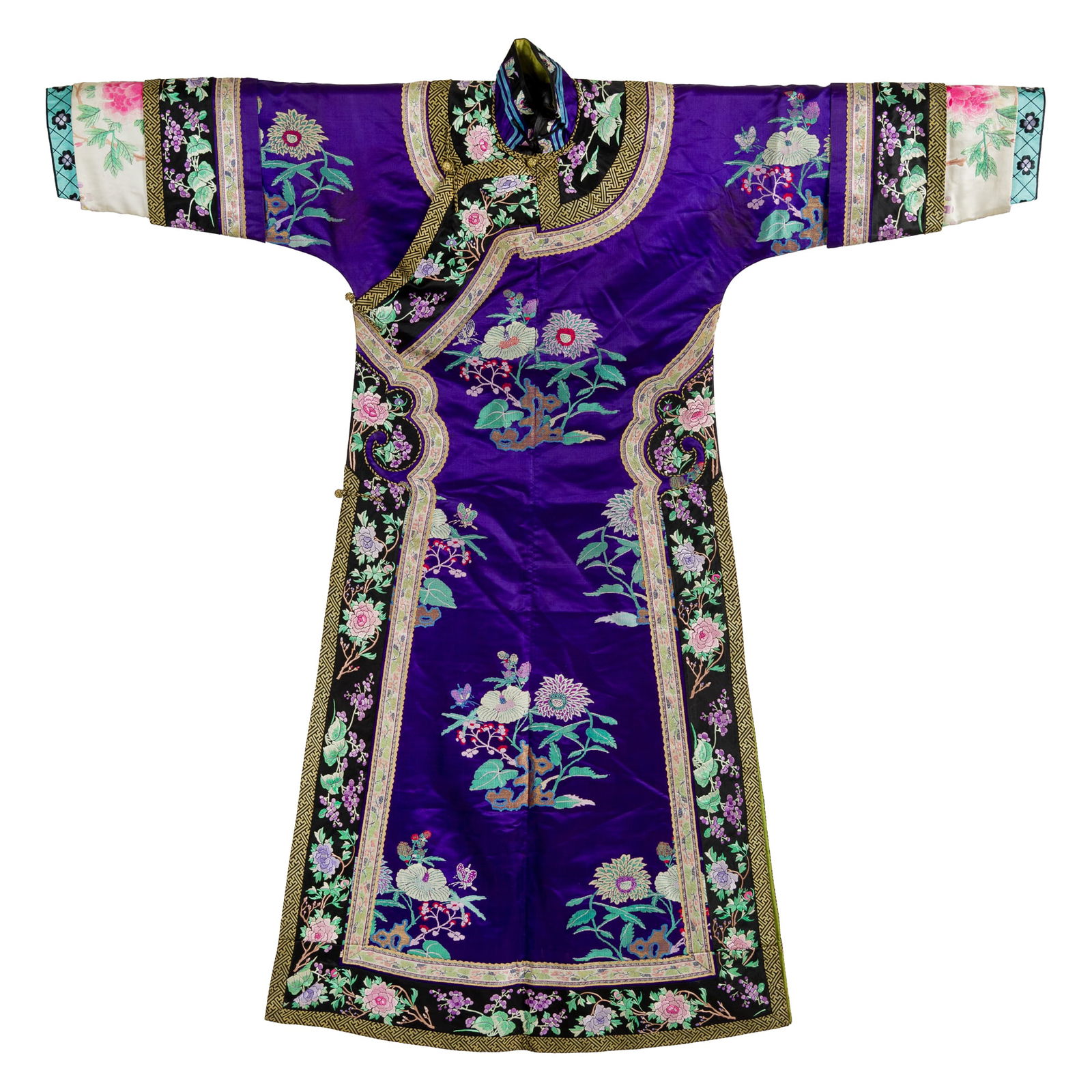 A Chinese purple-ground embroidered lady's robe, 19th century: A Chinese purple-ground embroidered lady's robe19th centuryDecorated with floral roundels set against a purple ground, framed by black-ground borders.H: 55 3/4, W: 53 5/8 in. (H: 141.6, W: 136.2