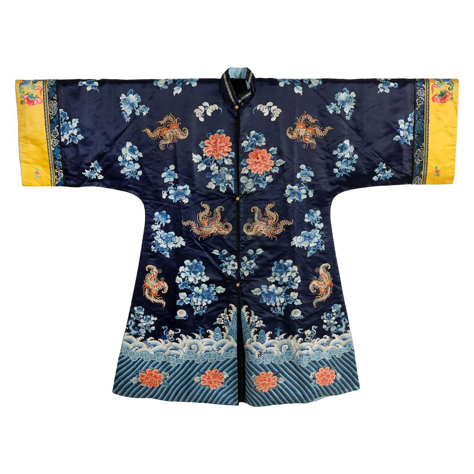 A Chinese stone-blue-ground embroidered lady's robe, 19th century: A Chinese stone-blue-ground embroidered lady's robe19th centuryEmbroidered in forbidden stitch with butterflies and peonies on a stone-blue ground.H: 46 1/4, W: 59 in. (H: 117.5, W: 149.9 cm.)From