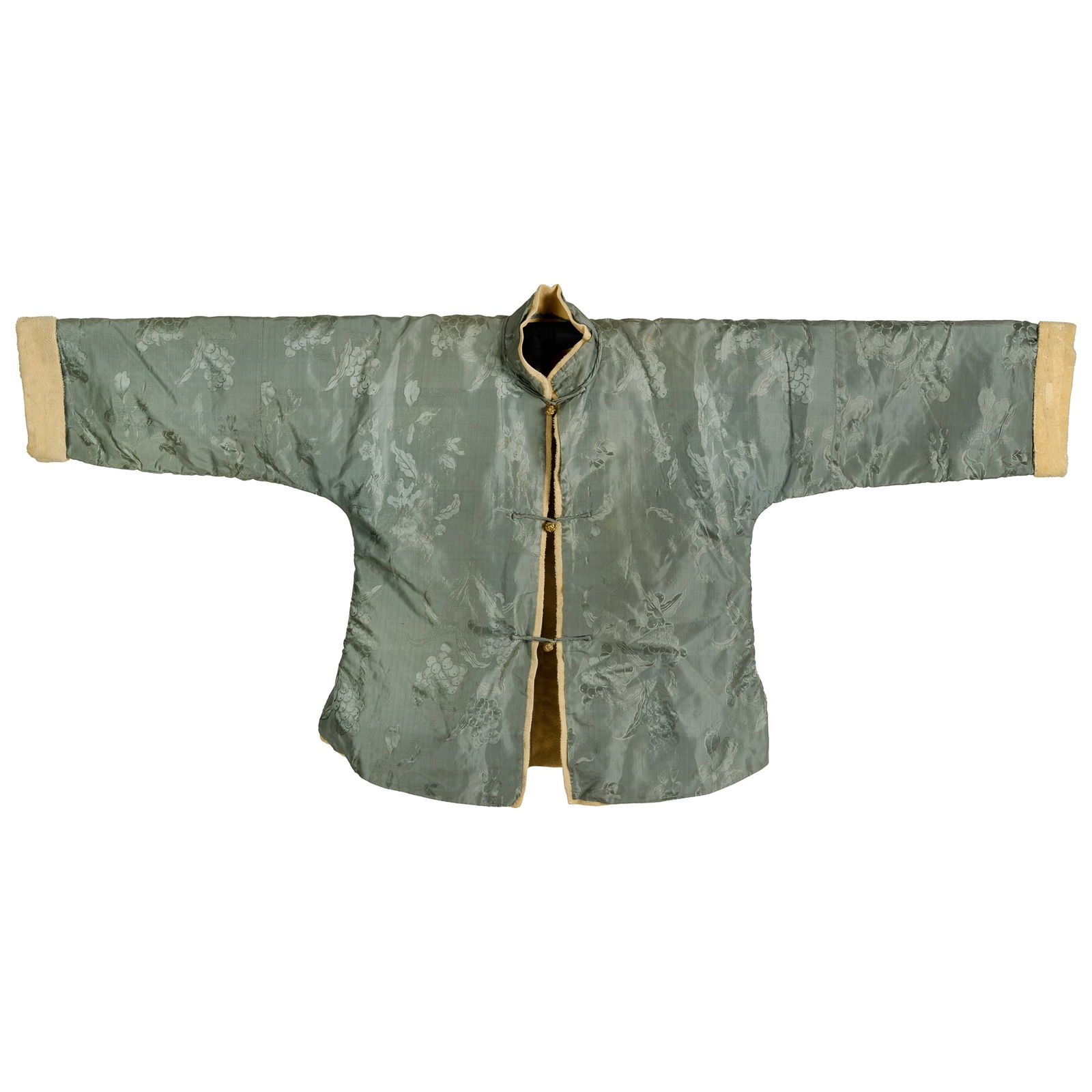 A Chinese sky-blue satin woman's jacket with sheepskin lining, 19th century: A Chinese sky-blue satin woman's jacket with sheepskin lining19th centuryH: 26 1/2, W: 54 1/4 in. (H: 67.3, W: 137.8 cm.)From Mrs. Schmidt of Council Bluffs, Iowa; inherited from her father-in-law,