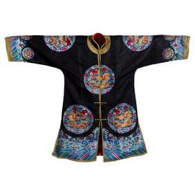A Chinese black-ground embroidered 'roundel dragon' jacket, 19th century