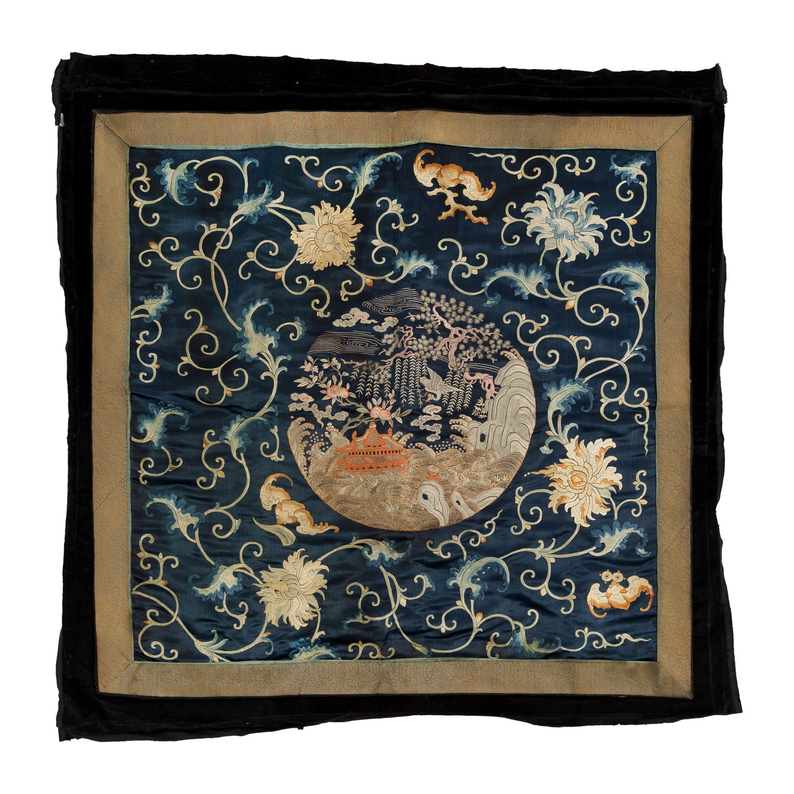 A Chinese blue-ground embroidery, 19th century: A Chinese blue-ground embroidery19th centuryDepicting a central roundel of a palace set within a landscape, surrounded by scrolling flowers and bats.H: 44 3/4, W: 44 3/4 in. (H: 113.7, W: 113.7