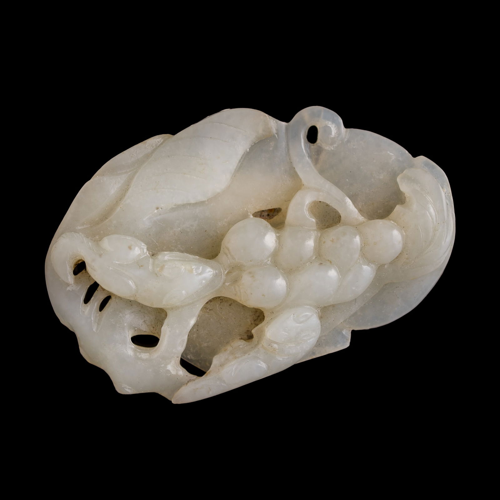 A Chinese white jade 'squirrel and grape' pendant, early 19th century (1 of 6)