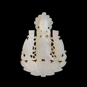 A Chinese white jade 'Guanyin' pendant, Yuan/Ming dynasty