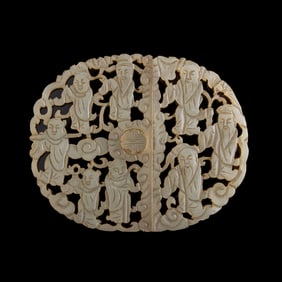A Chinese reticulated jade belt buckle, 19th century