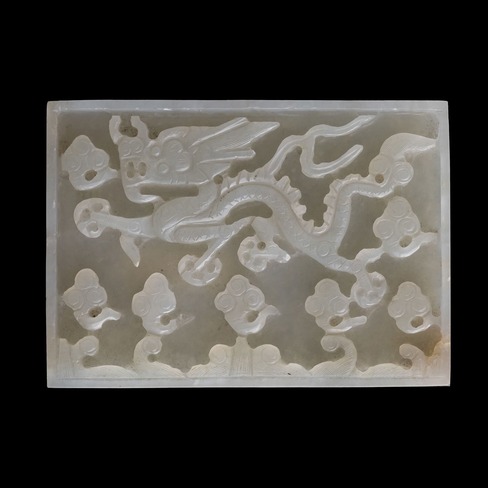 A Chinese jade 'dragon' belt plaque, Ming dynasty (1 of 8)