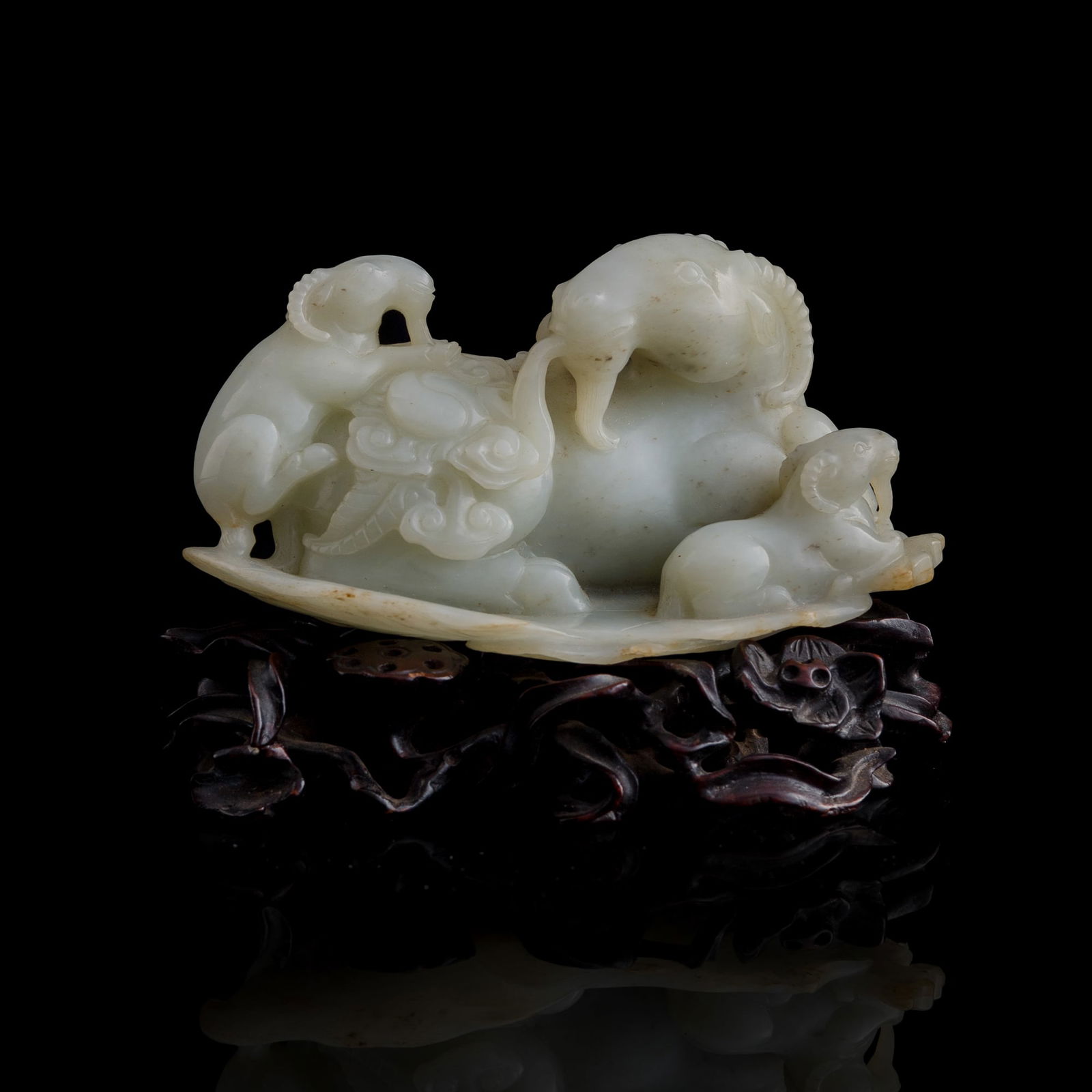 A Chinese white jade ornament of three goats, 19th century (1 of 7)