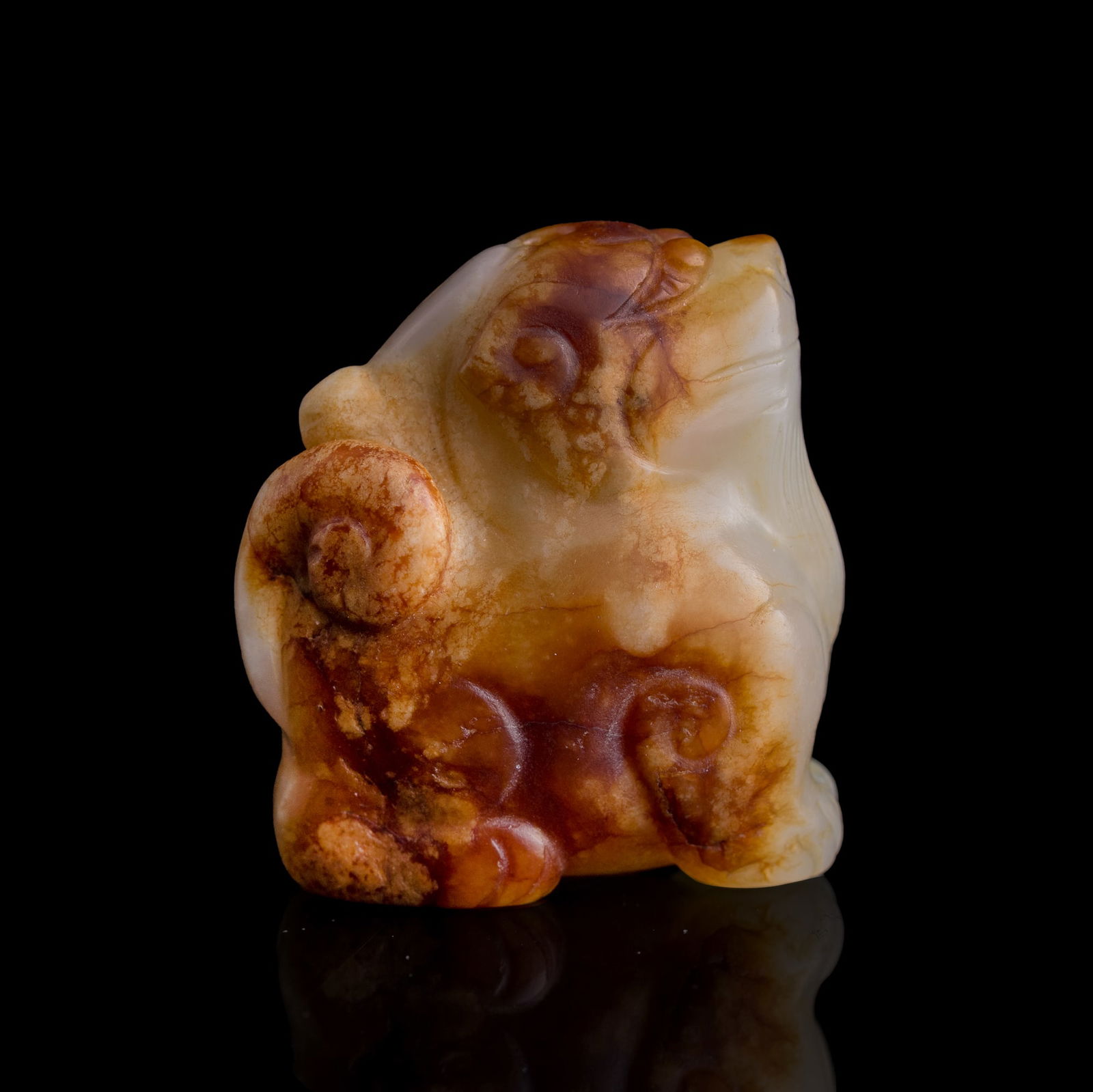 A Chinese jade beast-form pendant, Ming dynasty (1 of 8)
