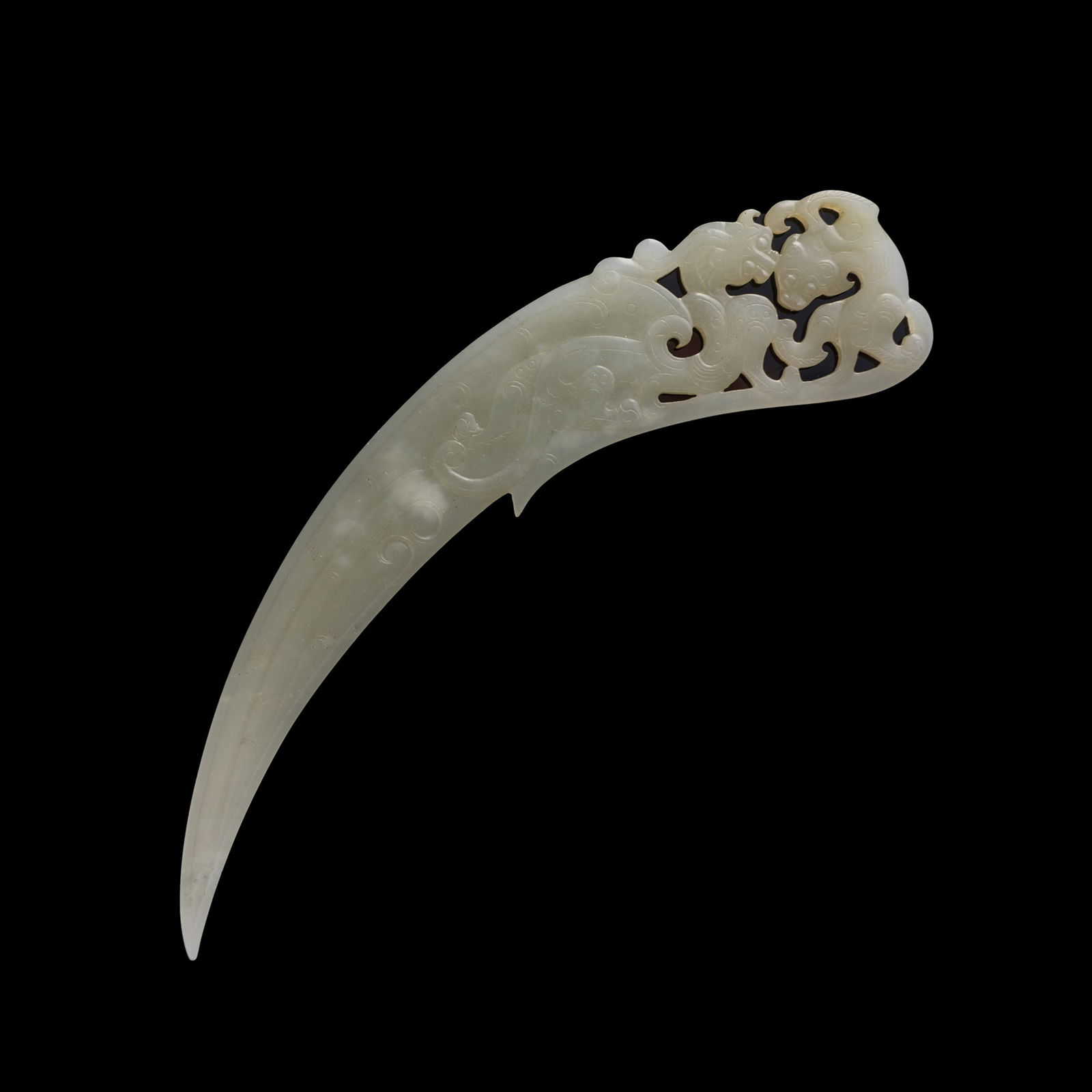 A Chinese white jade 'chilong' implement (xi), 18th century (1 of 8)