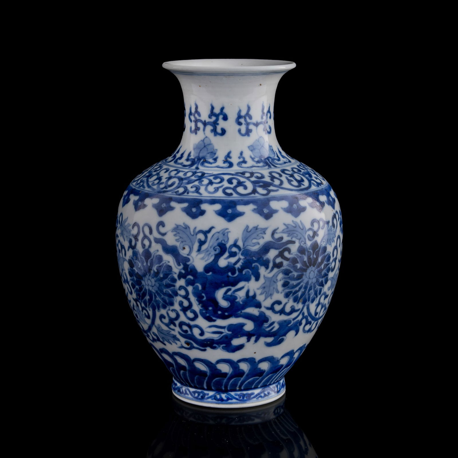A Chinese blue and white 'kui phoenix' vase, Republic period: A Chinese blue and white 'kui phoenix' vase Republic period With a double circle mark to the underside. H: 8 5/8, Dia: 5 3/4 in. (H: 21.9, Dia: 14.6 cm.) Private collection, Connecticut.
