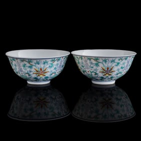 A pair of Chinese doucai 'lotus scrolls' bowls, Republic period