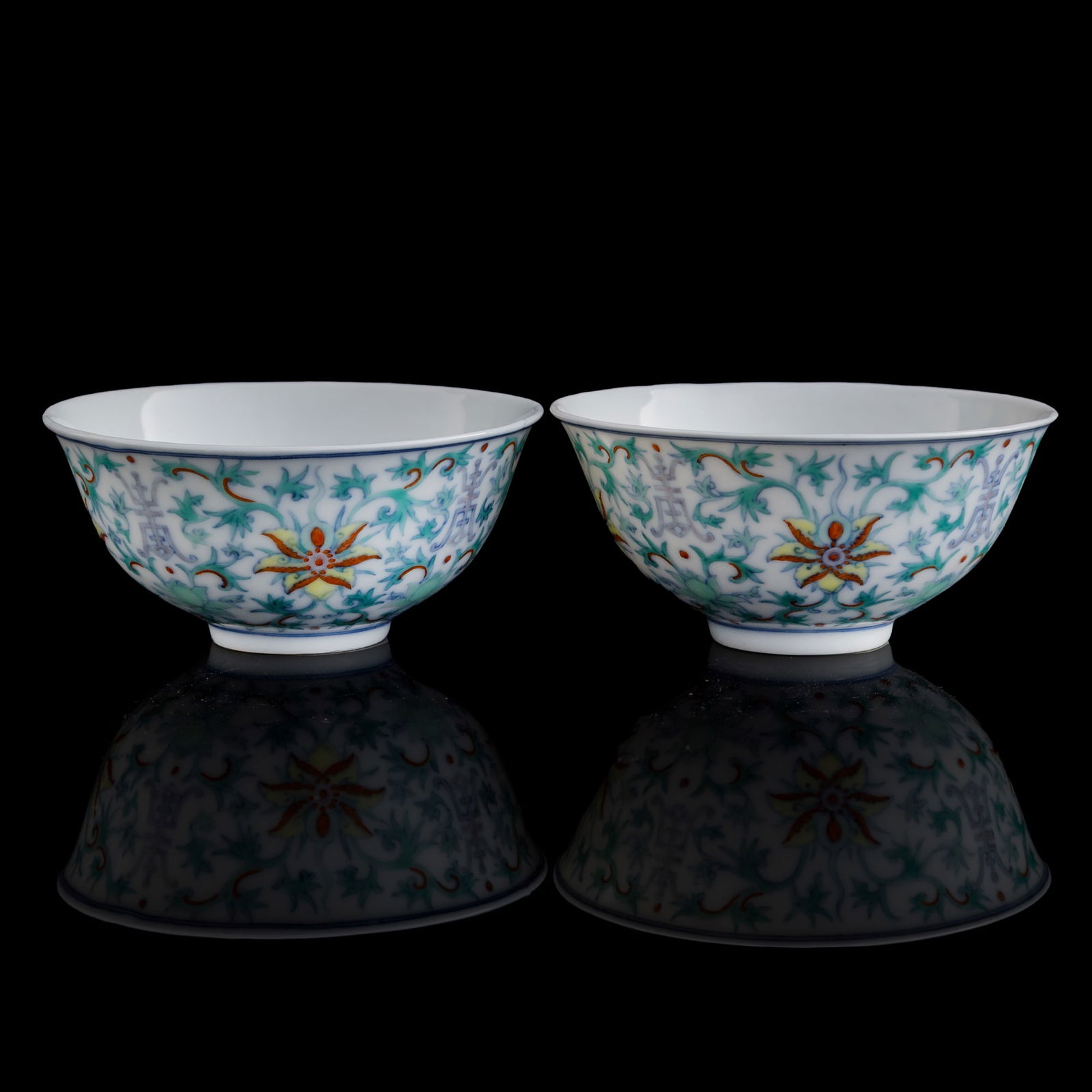 A pair of Chinese doucai 'lotus scrolls' bowls, Republic period (1 of 11)