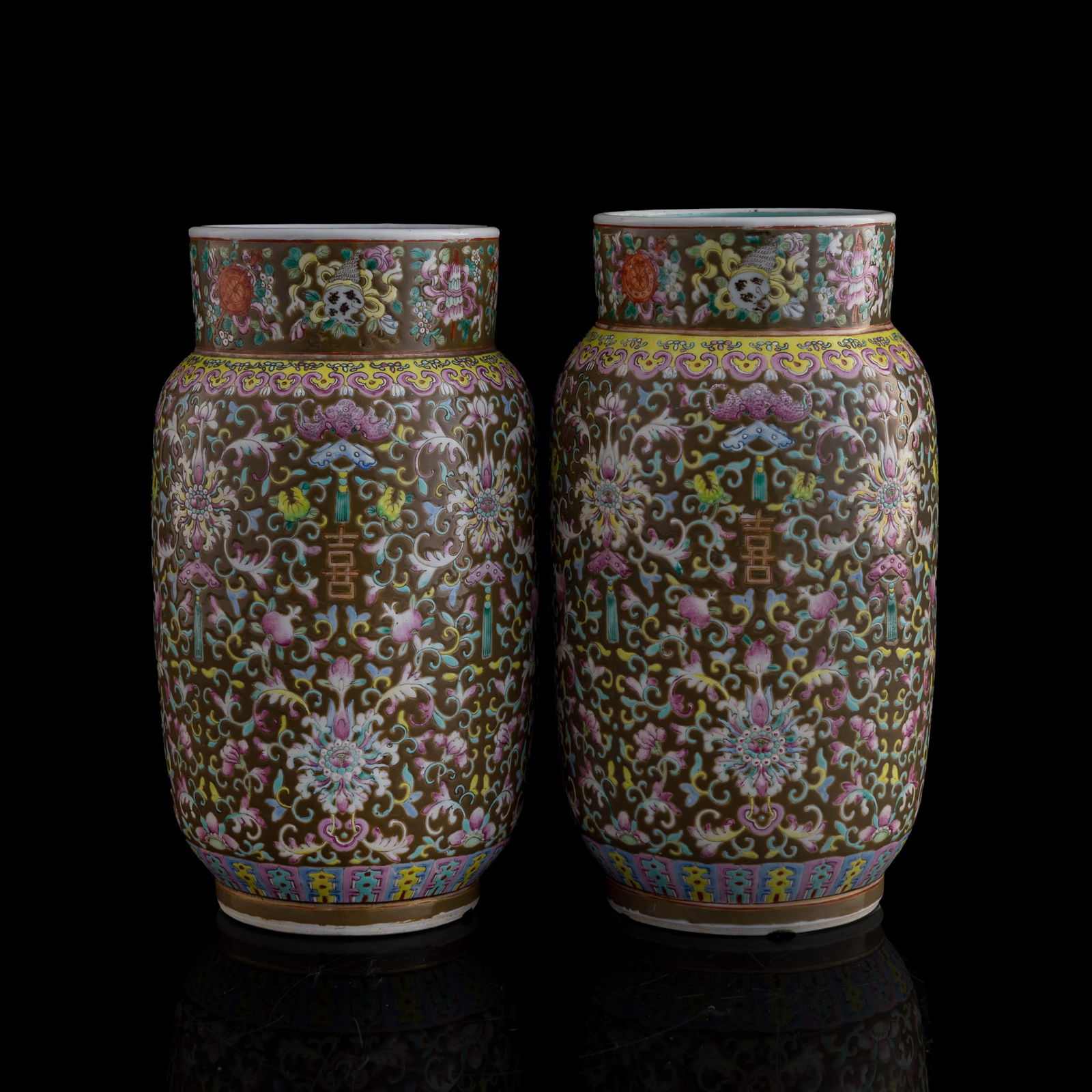 A pair of Chinese famille rose 'floral scrolls' and 'happiness' jars, 19th century: A pair of Chinese famille rose 'floral scrolls' and 'happiness' jars 19th century The rims are decorated with the 'Eight Buddhist Emblems' (bajixiang) motif. Each with "xi" (happiness) character to un