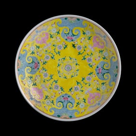 A Chinese yellow-ground famille rose plate, 19th century