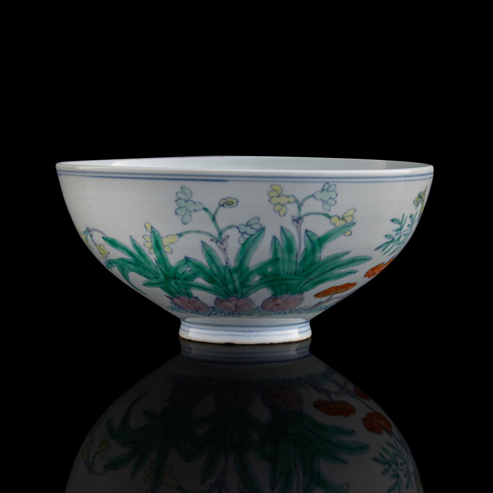 A Chinese doucai 'Immortals and lingzhi' chicken-heart bowl, Qianlong period, Qing dynasty (1 of 8)