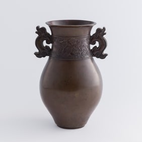 A Chinese bronze vase with double chilong handles, 19th century