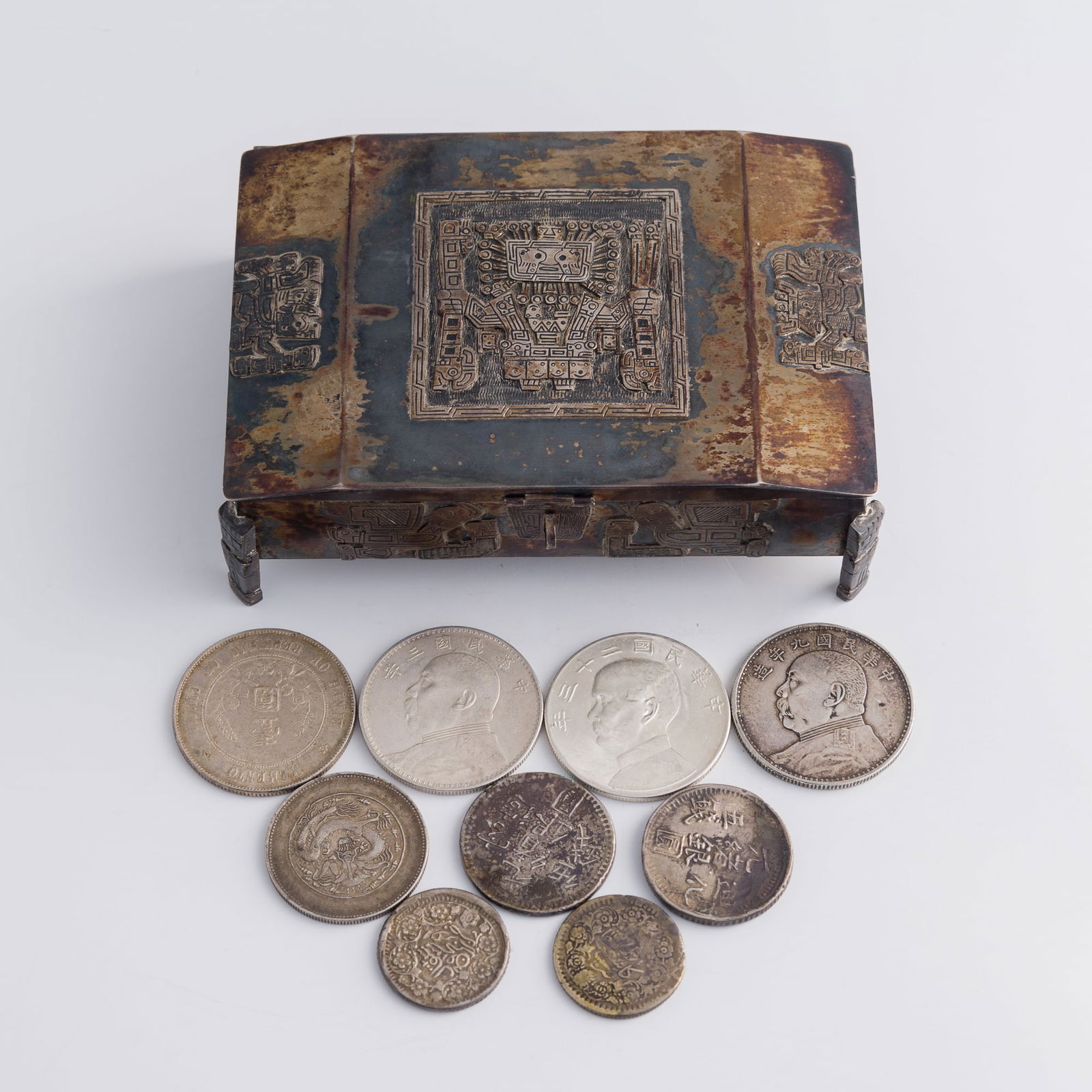 Nine Chinese silver coins and a silver box, Qing dynasty/Republic period (1 of 12)