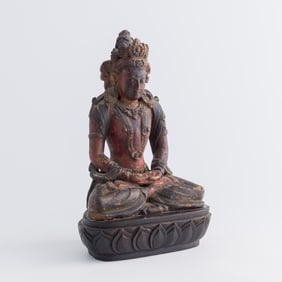 A Chinese gilt-lacquer zitan figure of Amitayus, 18th century