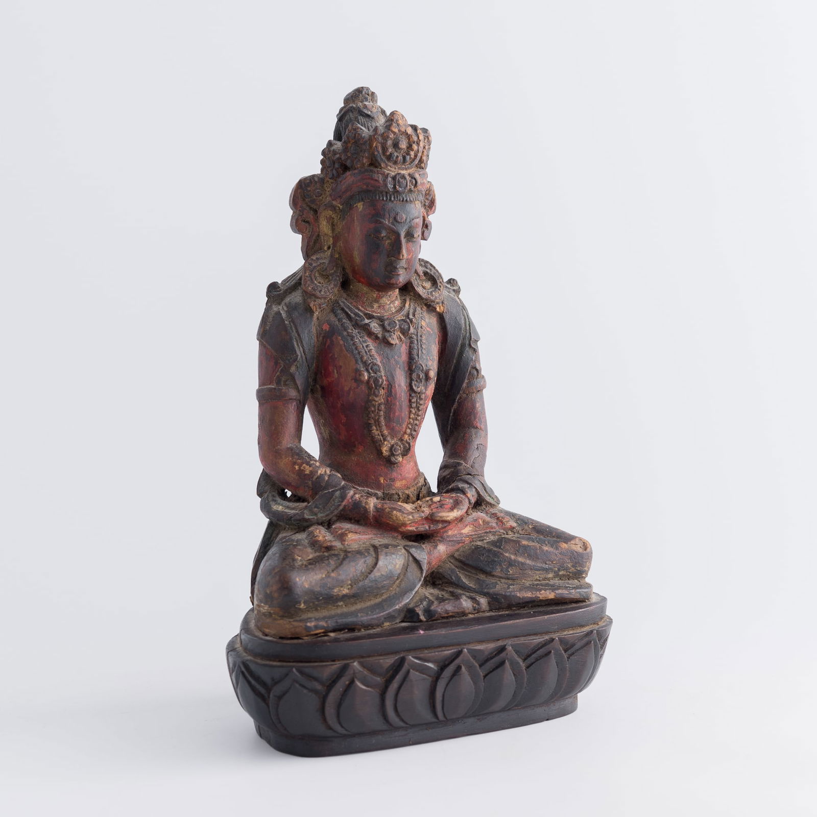 A Chinese gilt-lacquer zitan figure of Amitayus, 18th century (1 of 9)