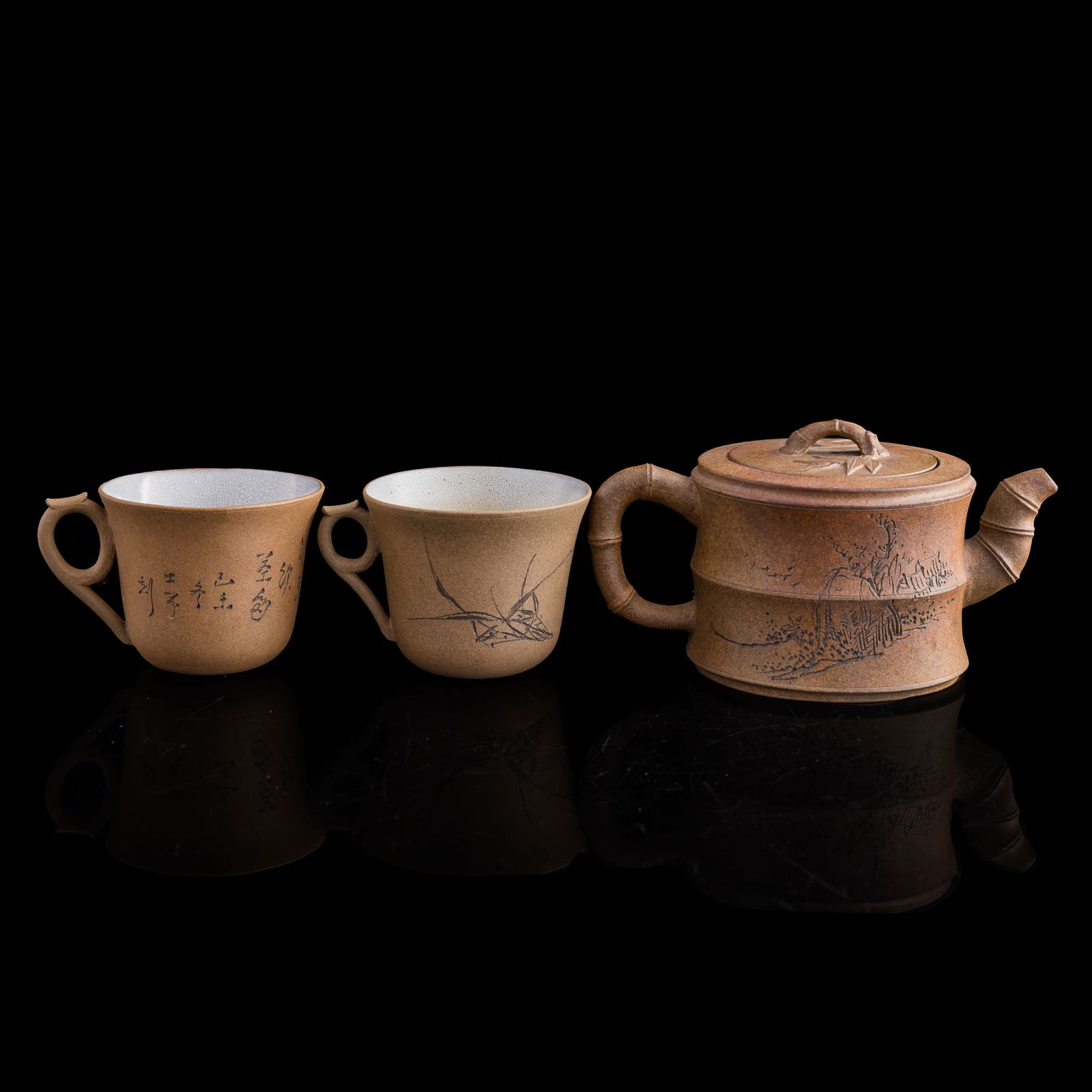 A Chinese zisha bamboo-shaped teapot and two cups, by Jiang Anqing, 19th century (1 of 10)