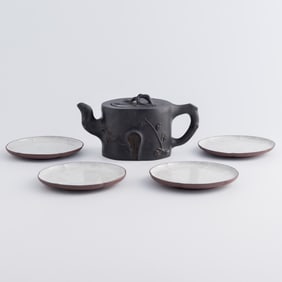 A Chinese Yixing teapot and four Yixing dishes, Republic period