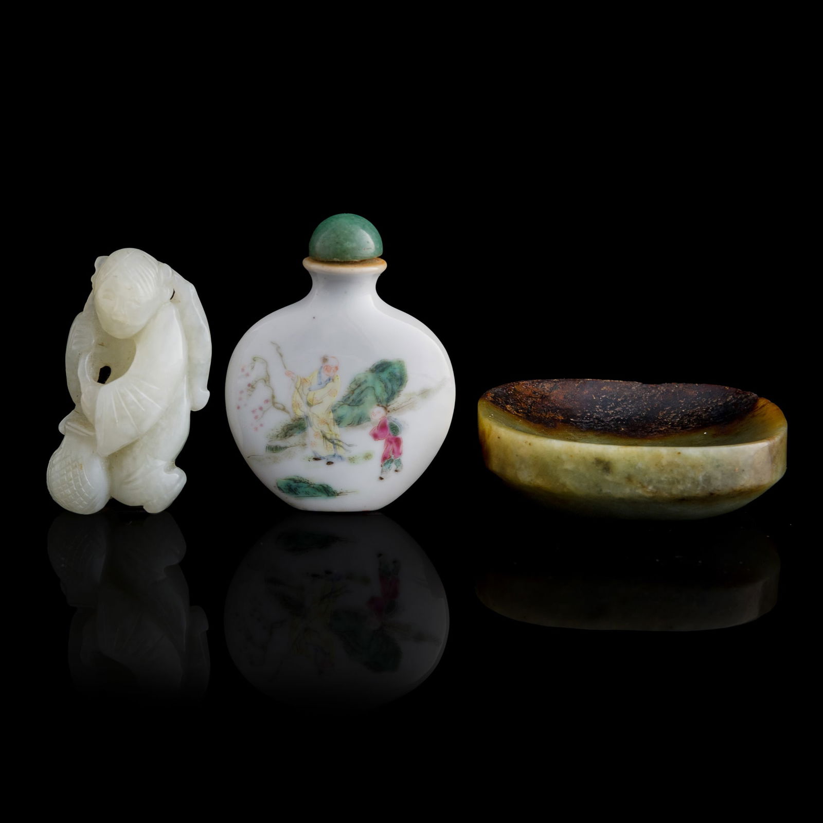 Two Chinese jades and a famille rose snuff bottle, 19th century (1 of 7)