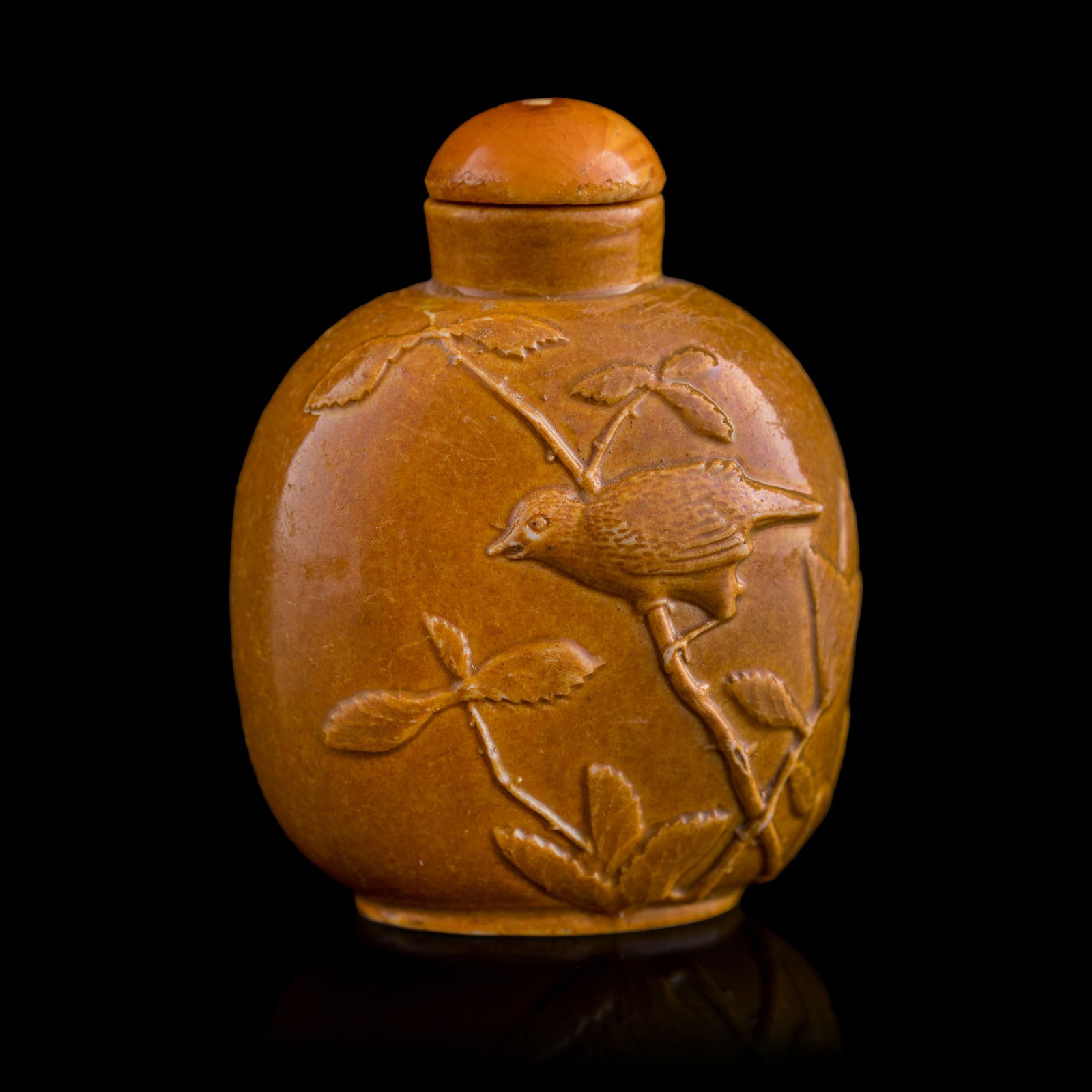 A Chinese carved porcelain snuff bottle, 19th century (1 of 8)