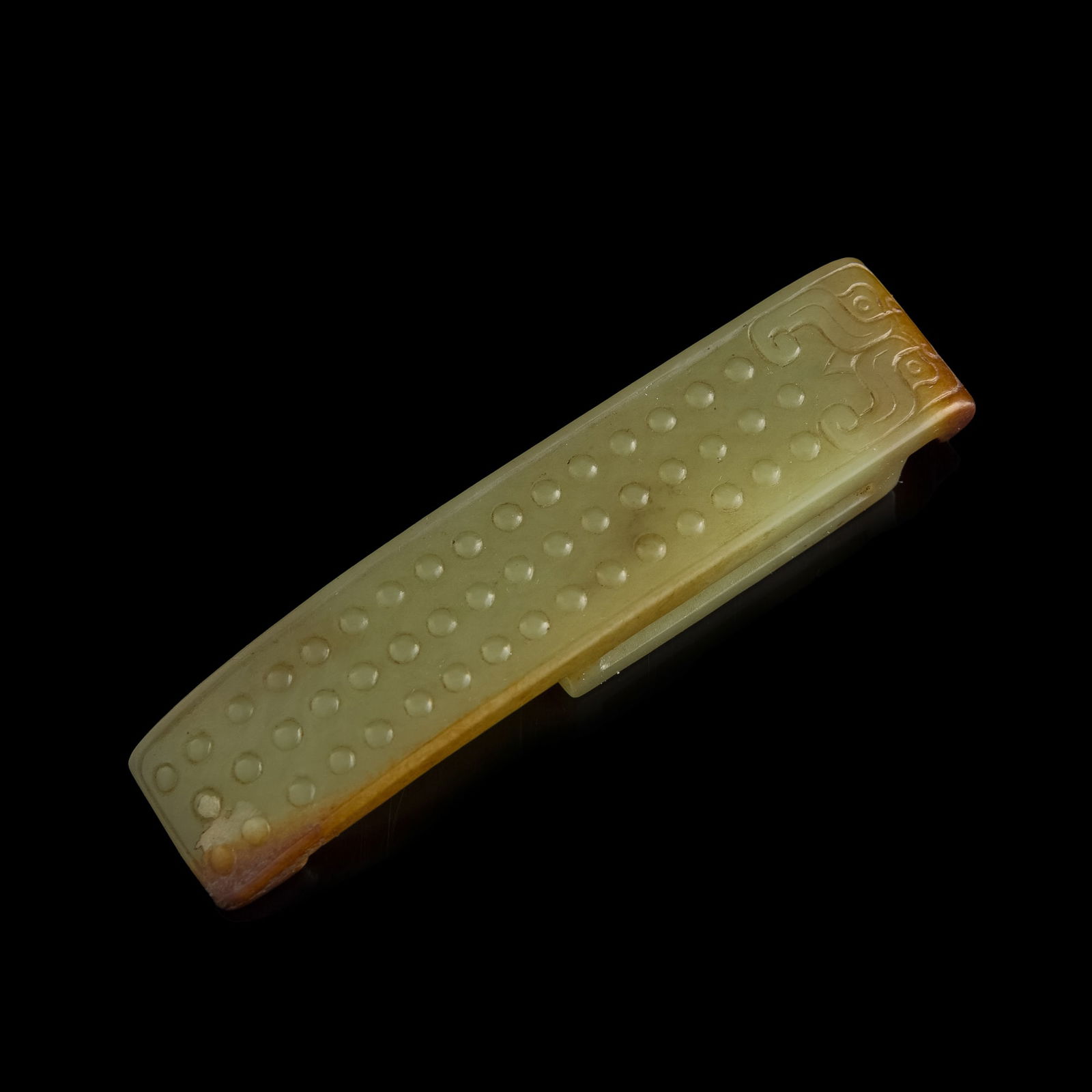 A Chinese yellow jade sword fitting, Ming dynasty or earlier (1 of 6)