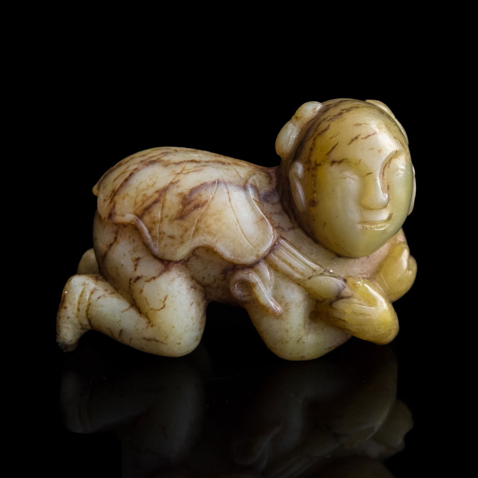 A Chinese jade figure of a boy, Ming dynasty or earlier (1 of 8)
