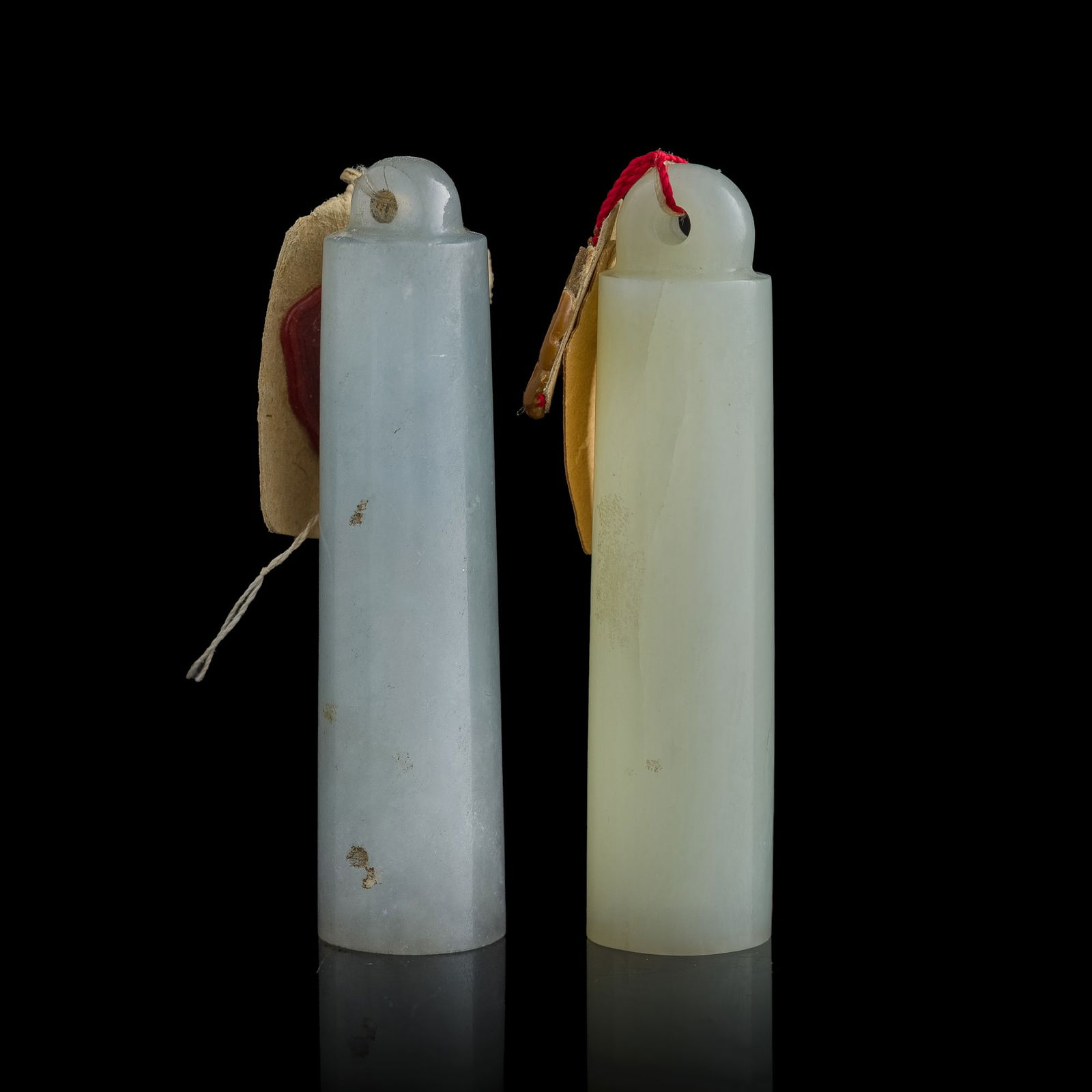 A Chinese white jade and a jadeite feather tube, 19th century (1 of 7)