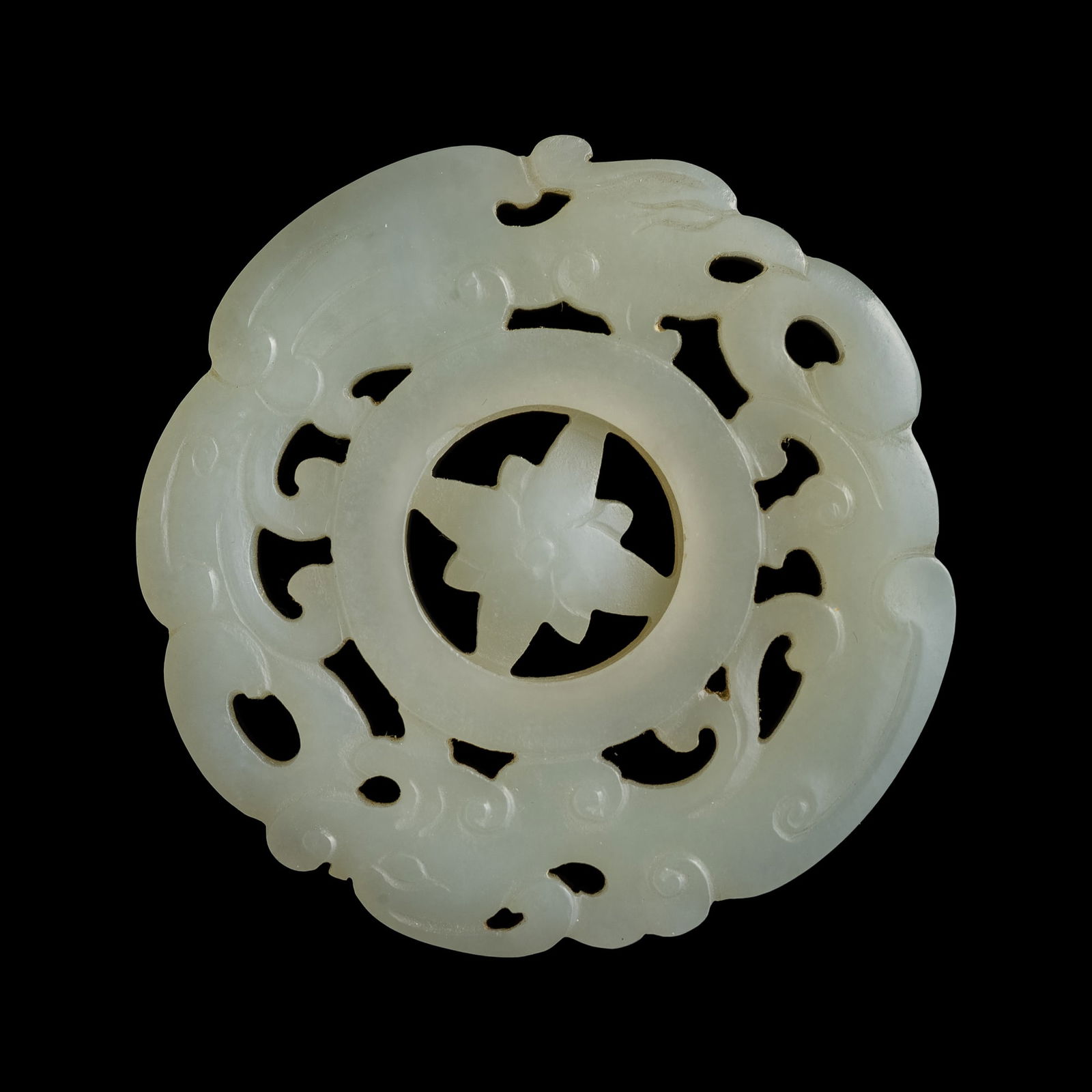 A Chinese white jade revolving bi disc, 18th century (1 of 6)