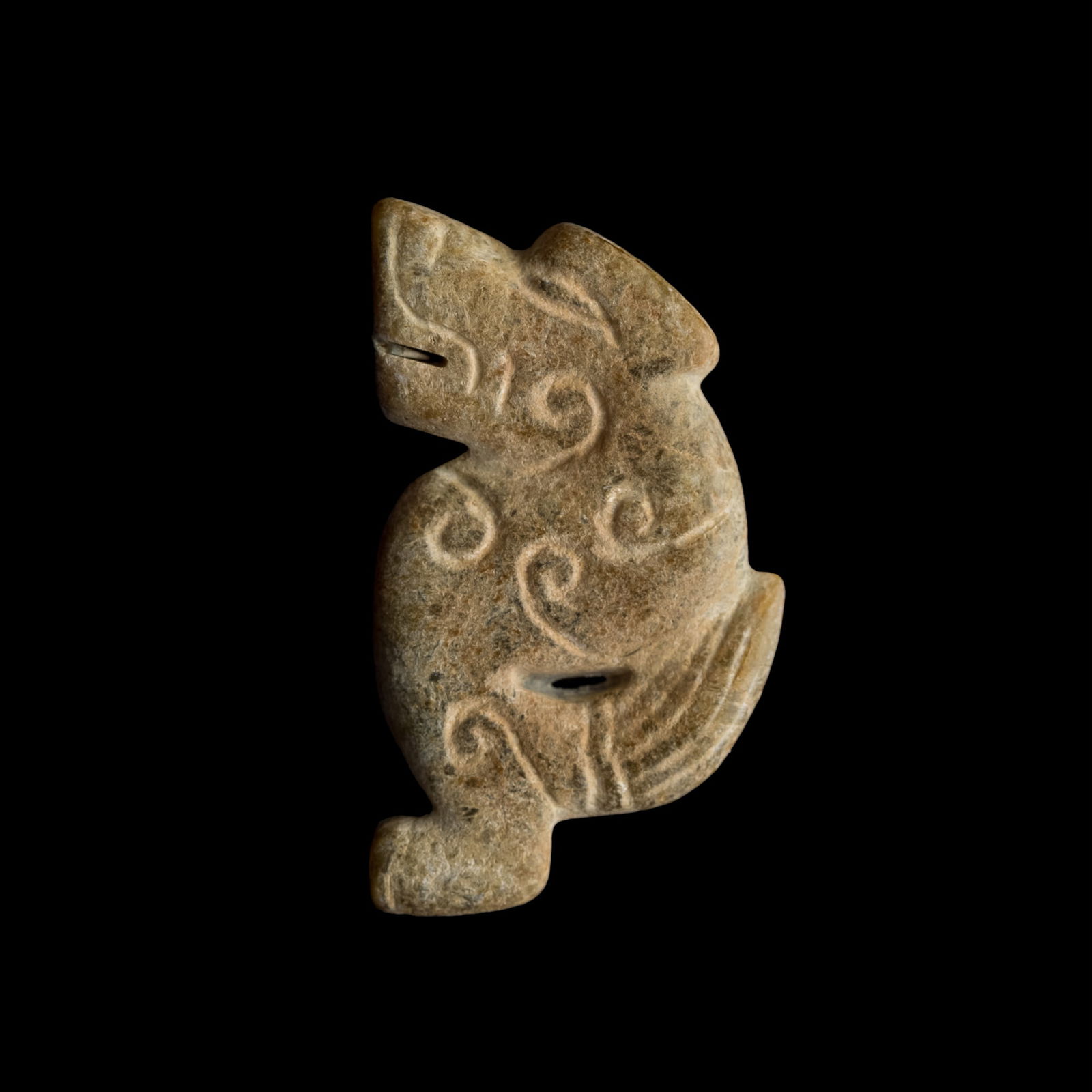 A Chinese jade pendant of a beast, Warring States period (1 of 8)