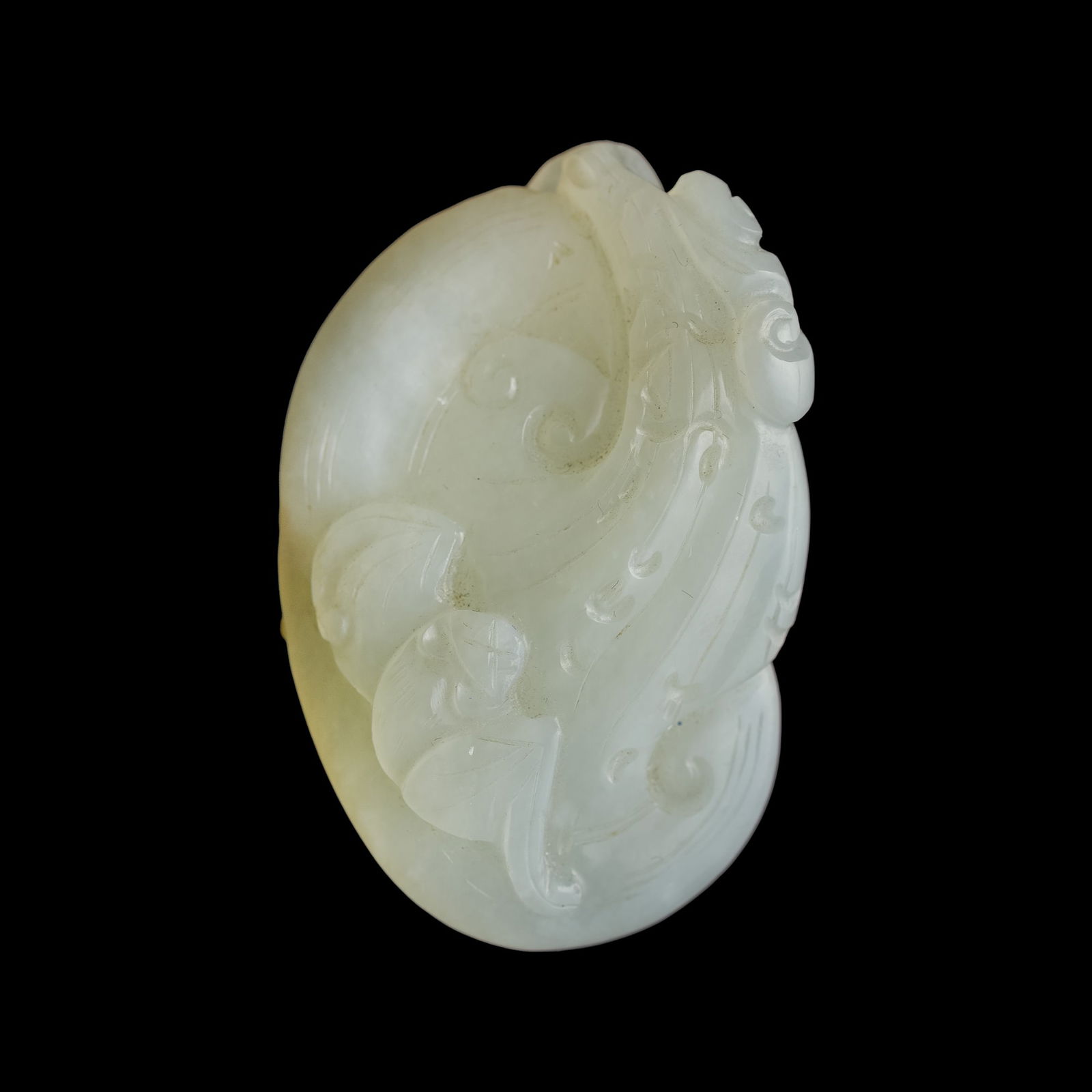 A Chinese white jade pendant of bat and lingzhi, 18th century (1 of 9)