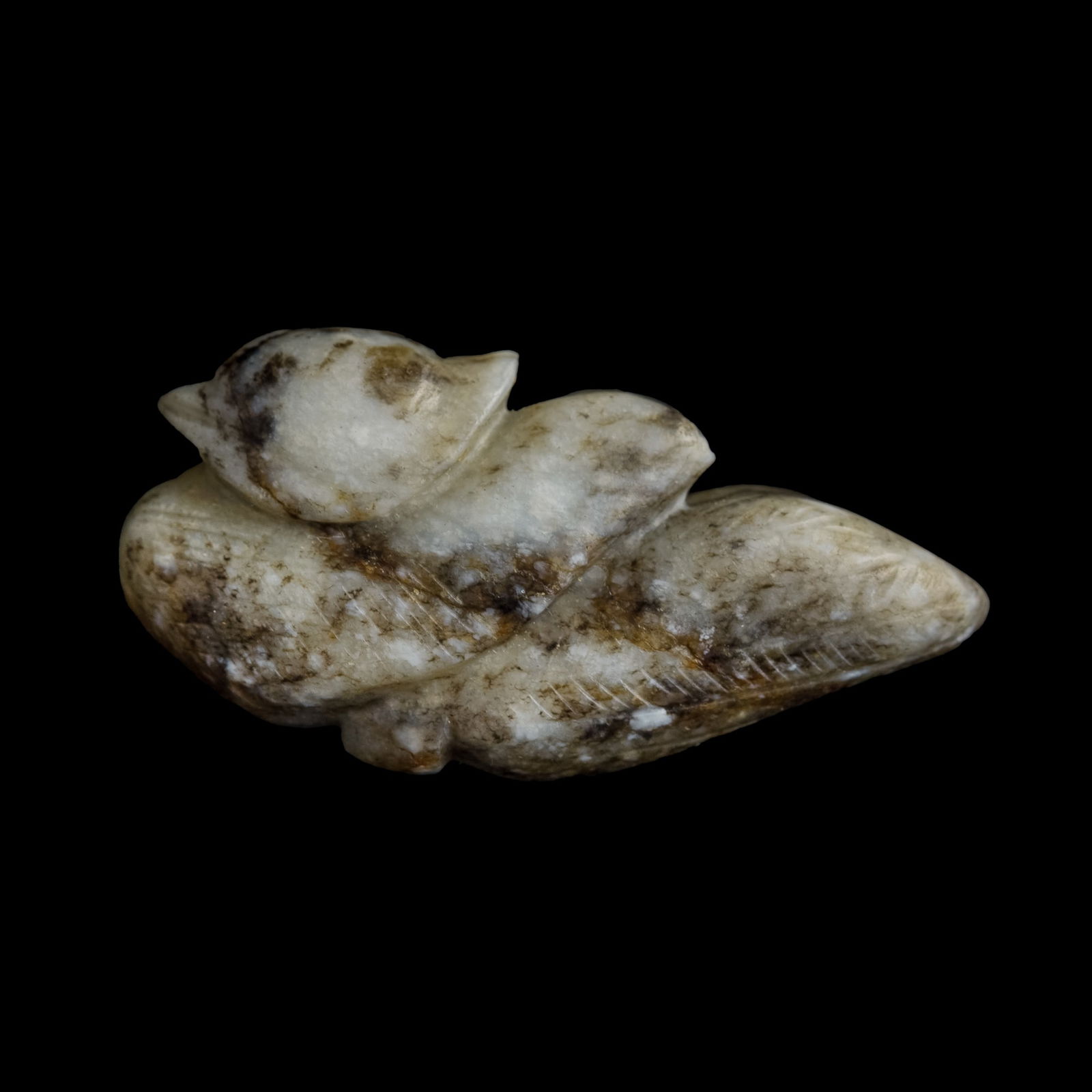 A Chinese jade pendant of mandarin duck, Ming dynasty or earlier (1 of 6)